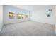 Spacious bedroom with wall-to-wall carpet and large windows at 3372 N Buchanan Way, Aurora, CO 80019
