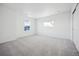 Bright bedroom with carpet flooring and large window at 3372 N Buchanan Way, Aurora, CO 80019