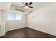 This bedroom has hardwood floors and a window providing ample natural light at 1121 Albion St # 809, Denver, CO 80220