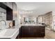 Contemporary kitchen open to the living area, showcasing modern design and ample counter space at 1121 Albion St # 809, Denver, CO 80220