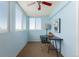 Bright office features large windows, a desk and chair with views from the windows at 1121 Albion St # 809, Denver, CO 80220