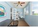 Brightly lit office with lots of natural light, built-in shelves and a full sized closet at 1121 Albion St # 809, Denver, CO 80220