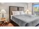 Comfortable bedroom with large windows and natural light and an outdoor view at 180 Emmett Lode Rd, Breckenridge, CO 80424
