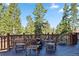 Charming deck with outdoor seating area offering breathtaking views at 180 Emmett Lode Rd, Breckenridge, CO 80424