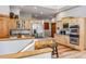 Spacious kitchen featuring stainless appliances, wood cabinets, and granite counters, perfect for cooking and entertaining at 180 Emmett Lode Rd, Breckenridge, CO 80424