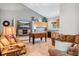 Spacious living area with comfortable seating, a TV, and convenient access to the adjacent kitchen at 180 Emmett Lode Rd, Breckenridge, CO 80424