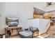 Cozy living area with a TV, comfortable seating, and easy access to the adjacent kitchen and dining spaces at 180 Emmett Lode Rd, Breckenridge, CO 80424