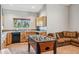 Bright recreation room features kitchenette, foosball table and cozy seating at 180 Emmett Lode Rd, Breckenridge, CO 80424