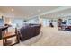 Finished basement featuring recessed lighting, carpet, and a leather sectional couch at 15975 Quandary Loop, Broomfield, CO 80023