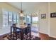 Bright breakfast area with table, chairs, and view to outdoor deck, perfect for morning meals at 15975 Quandary Loop, Broomfield, CO 80023