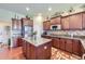 Beautiful kitchen with stainless steel appliances, granite countertops, and kitchen island at 15975 Quandary Loop, Broomfield, CO 80023