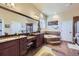 Spacious main bathroom with granite countertops, dual sinks, and a relaxing soaking tub at 15975 Quandary Loop, Broomfield, CO 80023