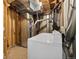 Basement laundry area with washer and dryer connections and mechanical equipment at 7234 E 38Th Ave, Denver, CO 80207
