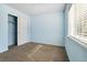 Comfortable bedroom featuring fresh paint, neutral carpet, and a closet at 7234 E 38Th Ave, Denver, CO 80207