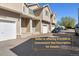 A townhouse complex featuring well-maintained exteriors, private garages and front entries at 7234 E 38Th Ave, Denver, CO 80207