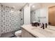 A modern bathroom with stylish black and white patterned tile in the shower at 3188 W 28Th Ave, Denver, CO 80211