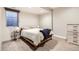 A well-lit bedroom with a large window and a simple, inviting aesthetic at 3188 W 28Th Ave, Denver, CO 80211