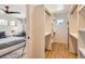 Large, walk-in closet with white shelving and hardwood floors, conveniently located next to the main bedroom at 3188 W 28Th Ave, Denver, CO 80211