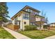 Stunning modern home with mixed siding, well-kept lawn, and inviting curb appeal at 3188 W 28Th Ave, Denver, CO 80211