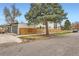 Modern two-story home with attached garage and fenced yard on a tree-lined street at 3188 W 28Th Ave, Denver, CO 80211