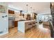 Sleek kitchen with a large island, stainless steel appliances, and modern cabinetry at 3188 W 28Th Ave, Denver, CO 80211
