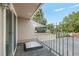 View of a condo balcony with metal railings and an outdoor sun roof, offering a relaxing outdoor space at 3210 S Oneida Way, Denver, CO 80224