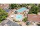 Aerial view of the community pools and surrounding amenities, providing a recreational and social hub at 3210 S Oneida Way, Denver, CO 80224