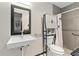 Accessible bathroom with roll-in shower and grab bars at 13950 E Oxford Pl # A115, Aurora, CO 80014