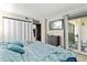 Bright bedroom with sliding door access to balcony at 13950 E Oxford Pl # A115, Aurora, CO 80014