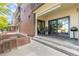 Private patio with seating area and grill at 13950 E Oxford Pl # A115, Aurora, CO 80014