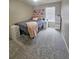Bedroom with plush carpeting, neutral paint, and window bringing in natural light at 23831 Eagle Bend Ln, Parker, CO 80138