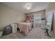 Bedroom with a bed, modern decor, and a neutral color palette to create a cozy, inviting space at 23831 Eagle Bend Ln, Parker, CO 80138