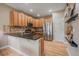 Well-lit kitchen with granite countertops, stainless steel appliances, and ample cabinet space at 23831 Eagle Bend Ln, Parker, CO 80138