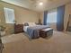 Inviting main bedroom featuring neutral walls, carpet and a window with light-filtering blinds at 23831 Eagle Bend Ln, Parker, CO 80138