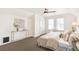 Bedroom featuring neutral decor, carpet, and two windows at 2826 Quitman St, Denver, CO 80212
