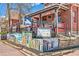 Exterior view of Highlands Cork & Cafe with mural and signage at 2826 Quitman St, Denver, CO 80212