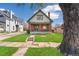Lovely front yard showcasing the home's facade, a green lawn, and a welcoming porch at 2826 Quitman St, Denver, CO 80212