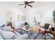 Comfortable living room with hardwood floors, ample seating, and stylish decor at 2826 Quitman St, Denver, CO 80212