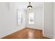 Empty room with hardwood floors and natural light at 2826 Quitman St, Denver, CO 80212