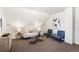 Cozy sitting room with neutral decor and carpet at 2826 Quitman St, Denver, CO 80212