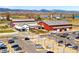 Aerial view of a recreational complex featuring parking, landscaping, and spacious grounds at 2366 Shoreside Dr, Berthoud, CO 80513