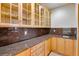 Pantry area with lots of cabinets, granite countertops, and a sink at 2366 Shoreside Dr, Berthoud, CO 80513