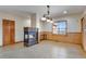 Inviting living room with a modern fireplace and lots of natural light at 2366 Shoreside Dr, Berthoud, CO 80513
