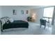 This bedroom features a large window and a comfortable setup for relaxation and productivity at 1020 15Th St # 29L, Denver, CO 80202