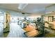 Well-equipped gym featuring treadmills, weight machines, and mirrored walls for a complete fitness experience at 1020 15Th St # 29L, Denver, CO 80202