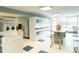 Bright and spacious laundry room, equipped with numerous machines and ample folding space at 1020 15Th St # 29L, Denver, CO 80202