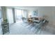 Cozy living room featuring a private balcony and contemporary decor at 1020 15Th St # 29L, Denver, CO 80202
