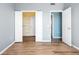 Bedroom view highlighting closet space and open doorway to other rooms at 7423 S Quail Cir # 1533, Littleton, CO 80127