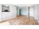 Open-concept living area with sleek floors and plenty of natural light at 7423 S Quail Cir # 1533, Littleton, CO 80127