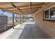 Covered carport area providing ample space for parking and protection from the elements at 9410 Cedar Ct, Thornton, CO 80229